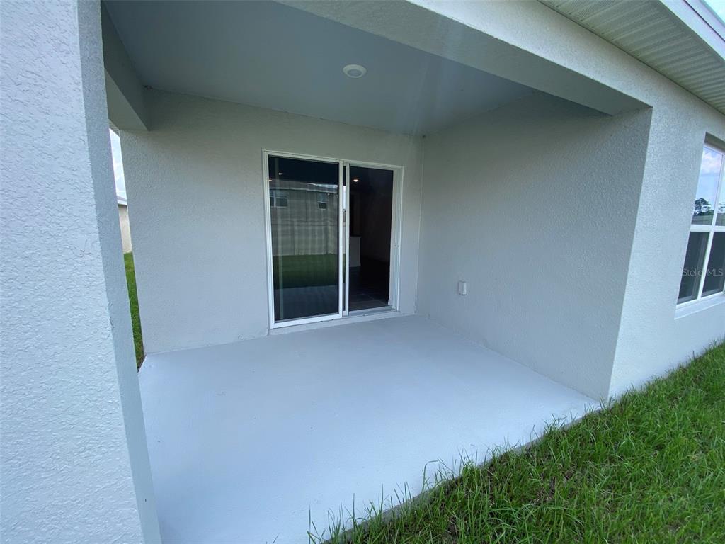 4961 Southwest 88th Place Ocala, FL 34476 - Photo 37 of 50 a view of an empty room with windows