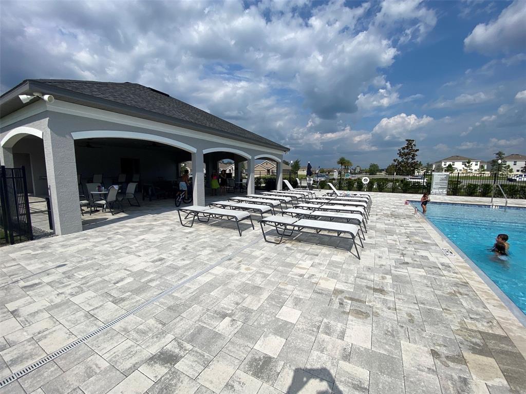 4961 Southwest 88th Place Ocala, FL 34476 - Photo 49 of 50 a view of house with yard and entryway