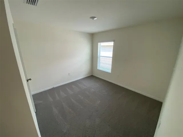 an empty room with closet