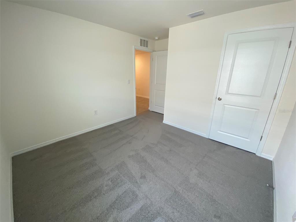 4961 Southwest 88th Place Ocala, FL 34476 - Photo 10 of 50 a view of an empty room
