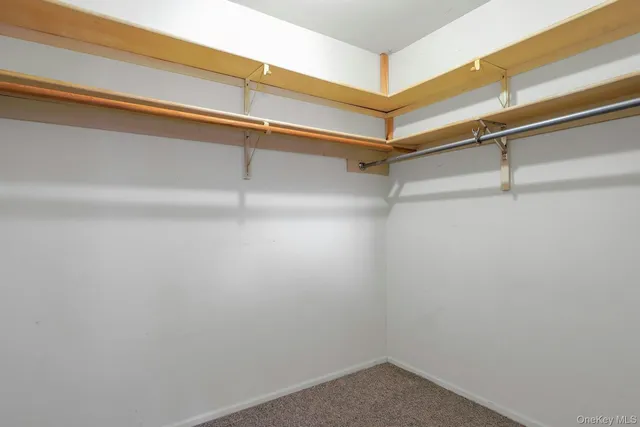 a view of a room with racks on the wall