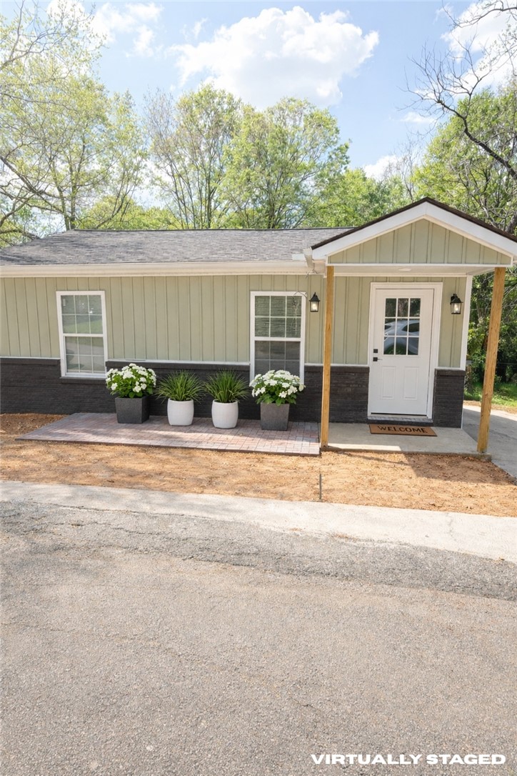 221 Richey Street Anderson, SC 29625 - Photo 1 of 22 This charming home features a welcoming covered porch, ideal for relaxation and curb appeal.