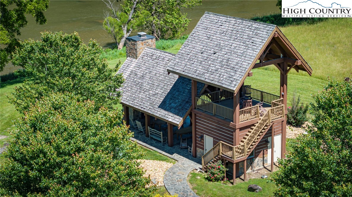 24 Moxley Ridge Road Independence, VA 24348 - Photo 12 of 20 a aerial view of a house with swimming pool and sitting area