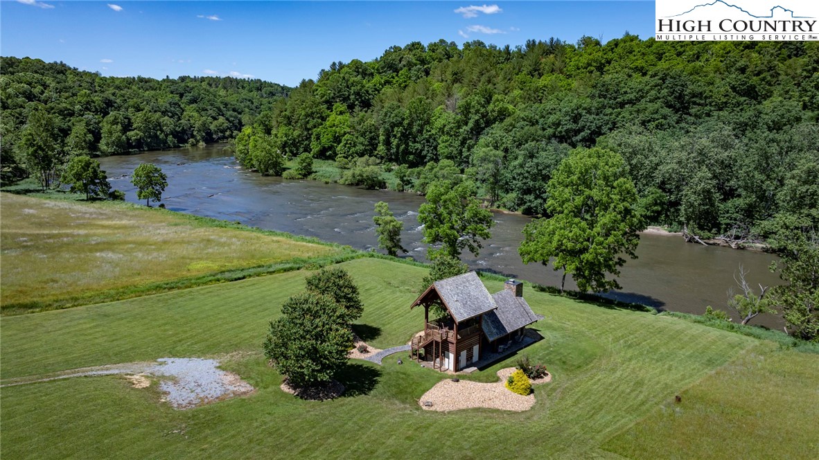 24 Moxley Ridge Road Independence, VA 24348 - Photo 16 of 20 a view of a lake with a yard