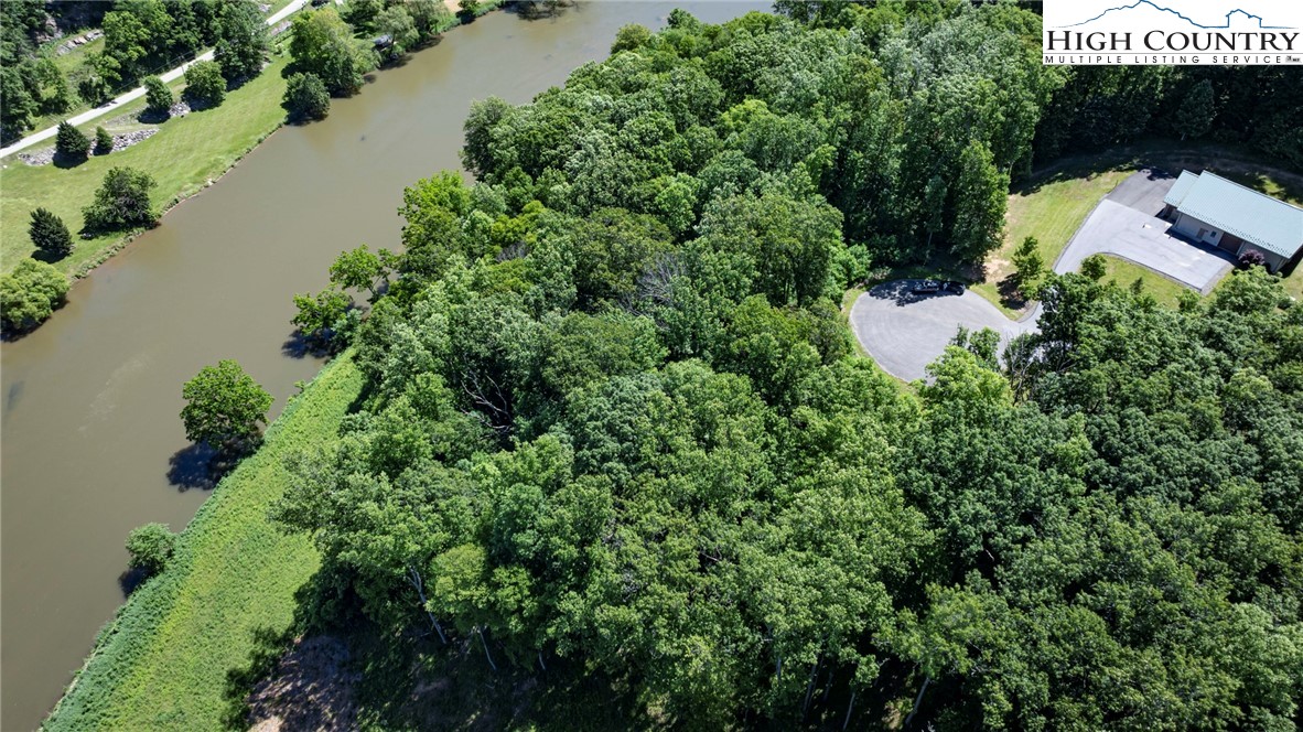 24 Moxley Ridge Road Independence, VA 24348 - Photo 20 of 20 an aerial view of a house with a yard and lake view