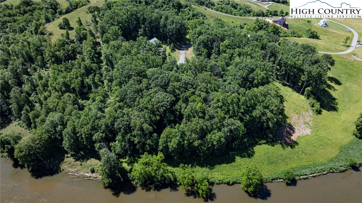 24 Moxley Ridge Road Independence, VA 24348 - Photo 3 of 20 an aerial view of a house with a yard