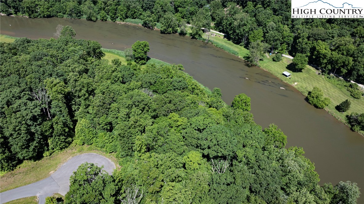 24 Moxley Ridge Road Independence, VA 24348 - Photo 8 of 20 an aerial view of a house with a yard and lake view