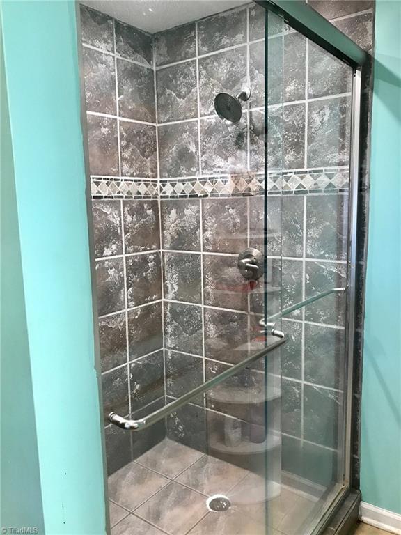 6313 Radds Street Lexington, NC 27295 - Photo 8 of 11 Beautiful walk in Master Shower w/ sliding glass doors!