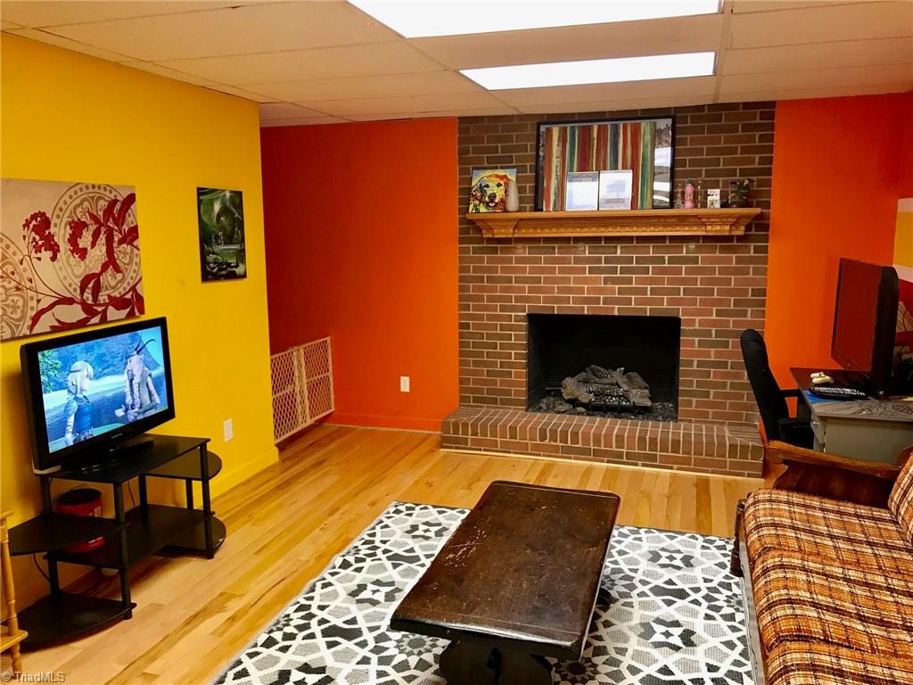 6313 Radds Street Lexington, NC 27295 - Photo 10 of 11 Finished Basement area w/ wood flooring