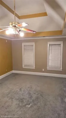 a view of an empty room with a chandelier