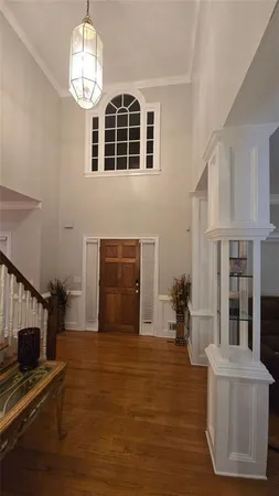 a view of livingroom with furniture and chandelier