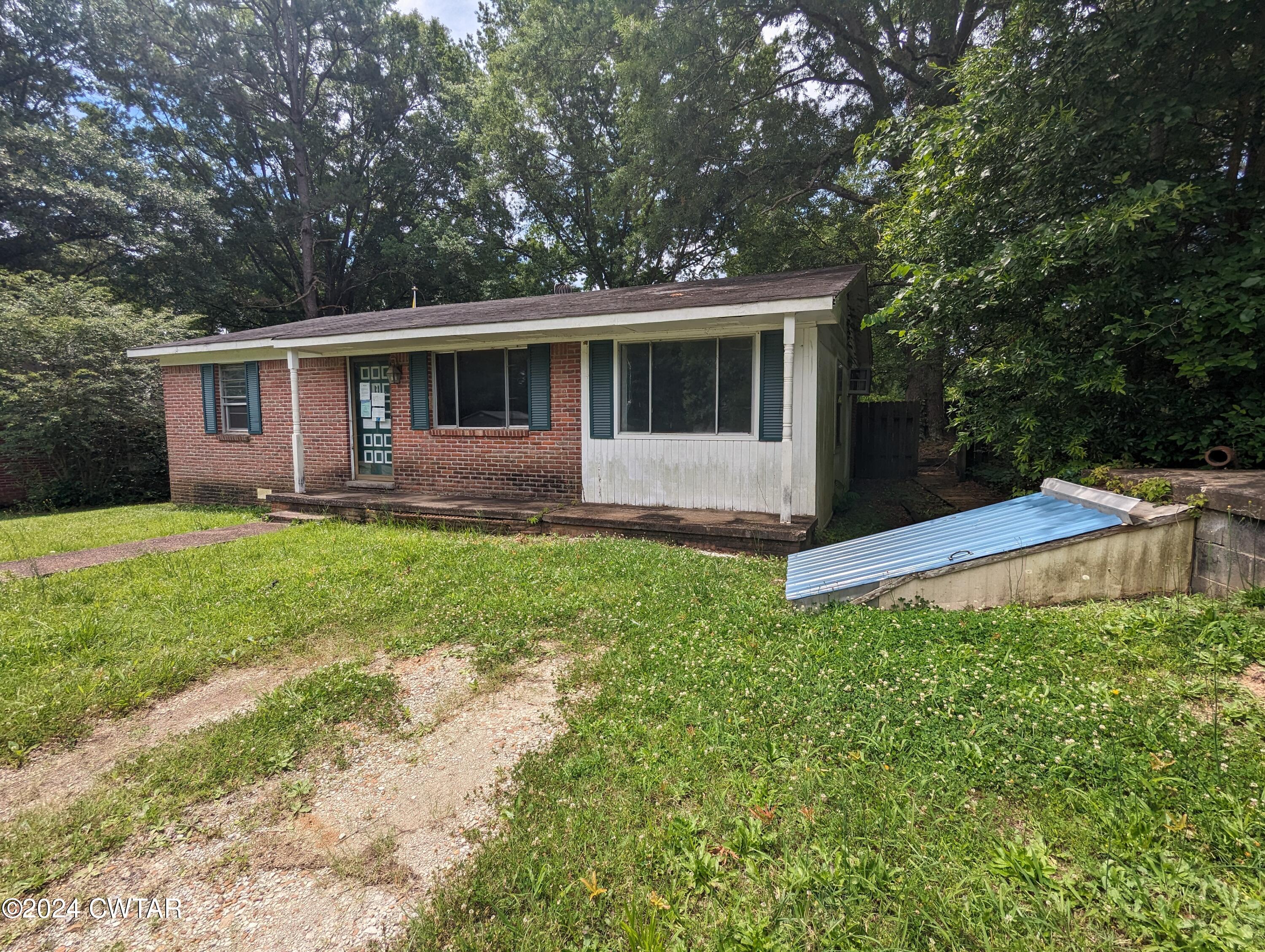 650 Old Finger Road Henderson, TN 38340 - Photo 3 of 19 a front view of house with yard and green space