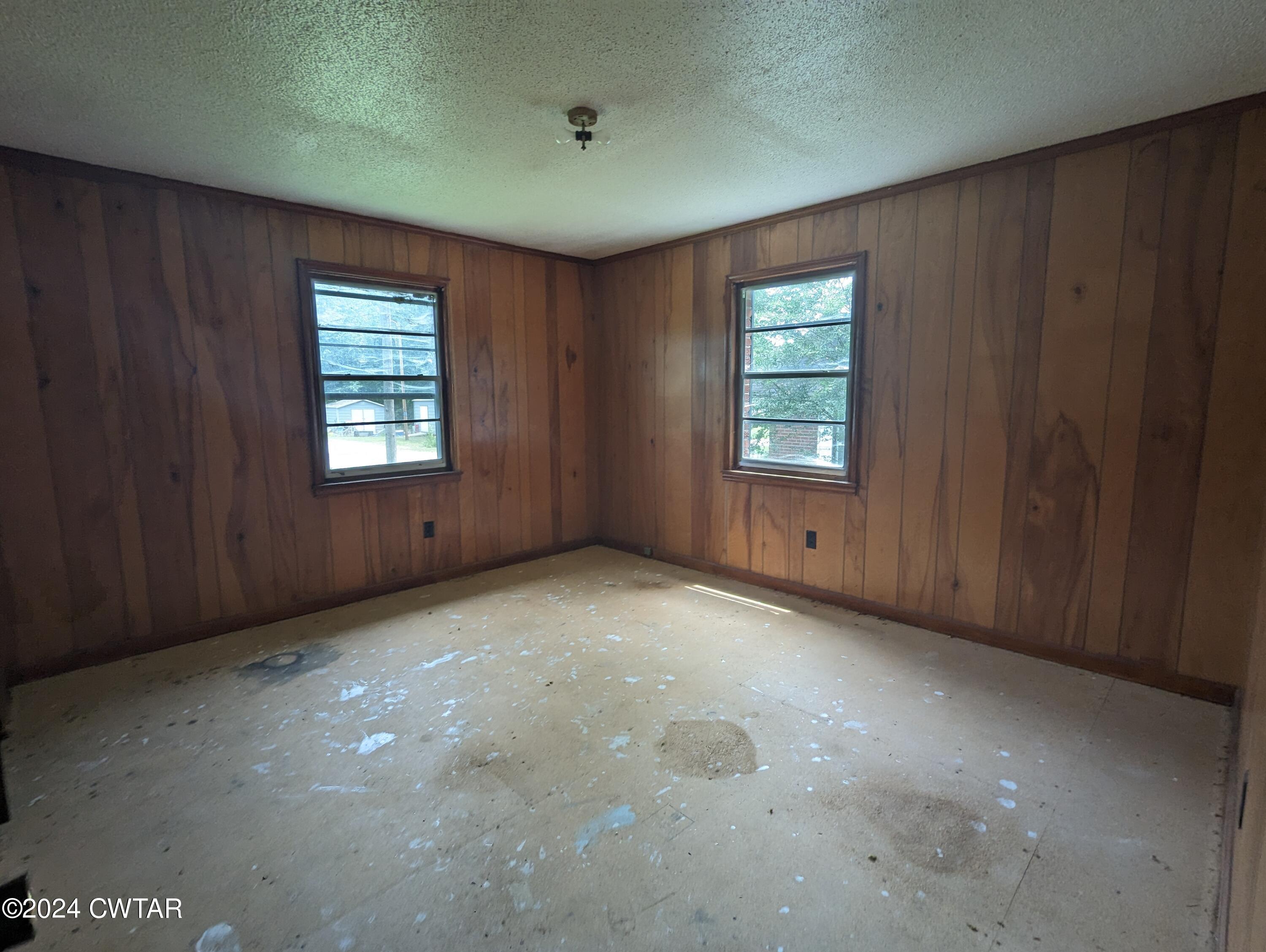 650 Old Finger Road Henderson, TN 38340 - Photo 9 of 19 an empty room with windows