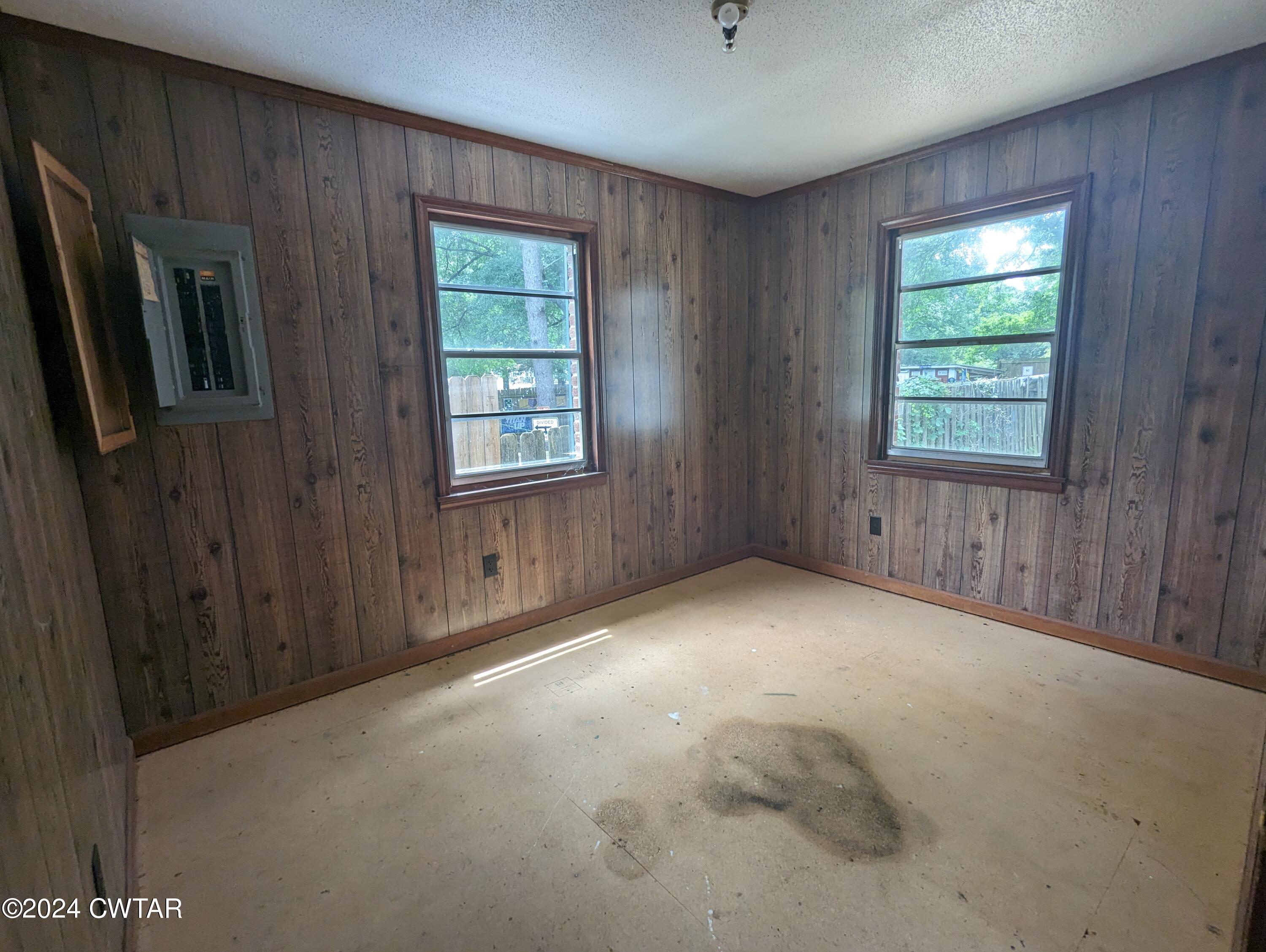 650 Old Finger Road Henderson, TN 38340 - Photo 10 of 19 a view of an empty room with a window
