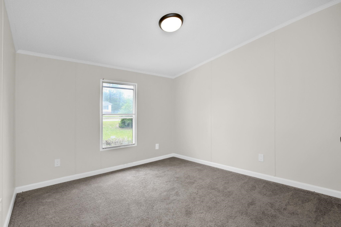 1357 Heritage Way Cameron, NC 28326 - Photo 20 of 28 an empty room with a window