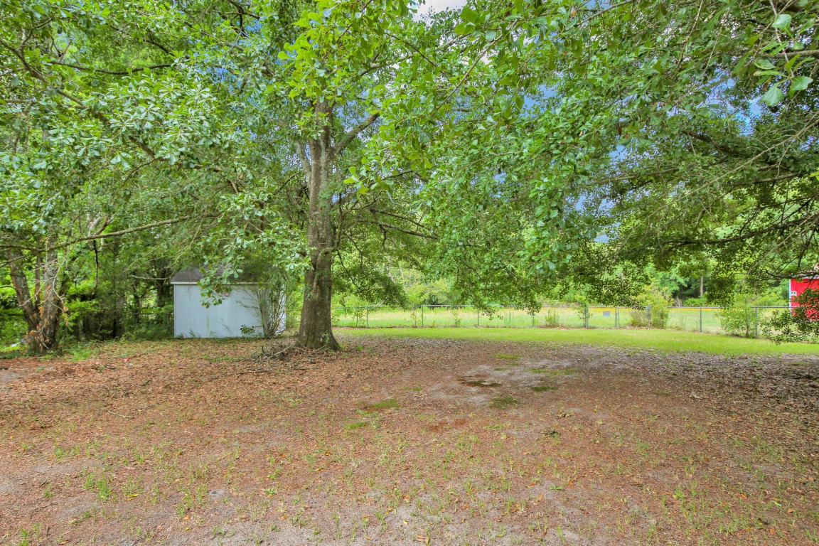 1357 Heritage Way Cameron, NC 28326 - Photo 28 of 28 a view of a yard with large trees