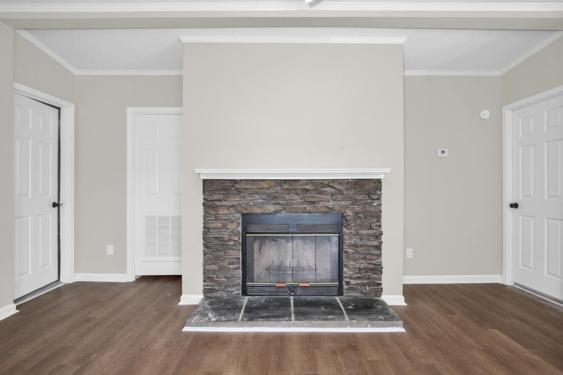1357 Heritage Way Cameron, NC 28326 - Photo 6 of 28 a room with a fireplace and a fireplace
