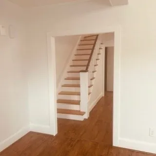 a view of a hallway with staircase