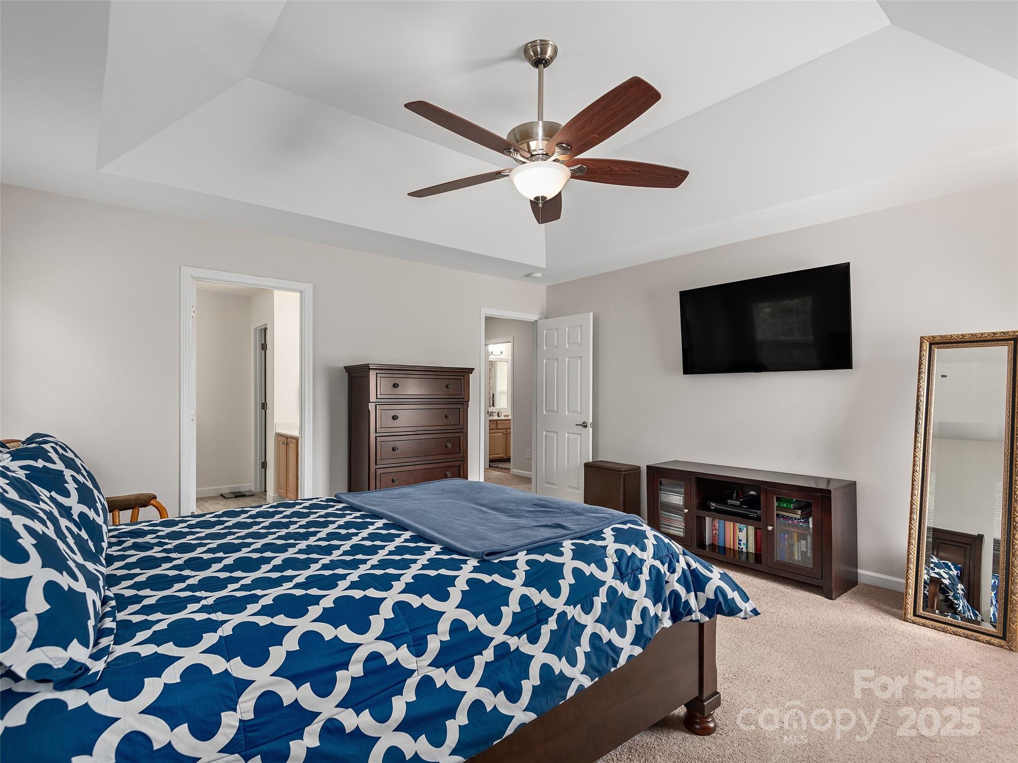 178 Black River Road Fletcher, NC 28732 - Photo 11 of 19 a bedroom with a bed and a flat screen tv