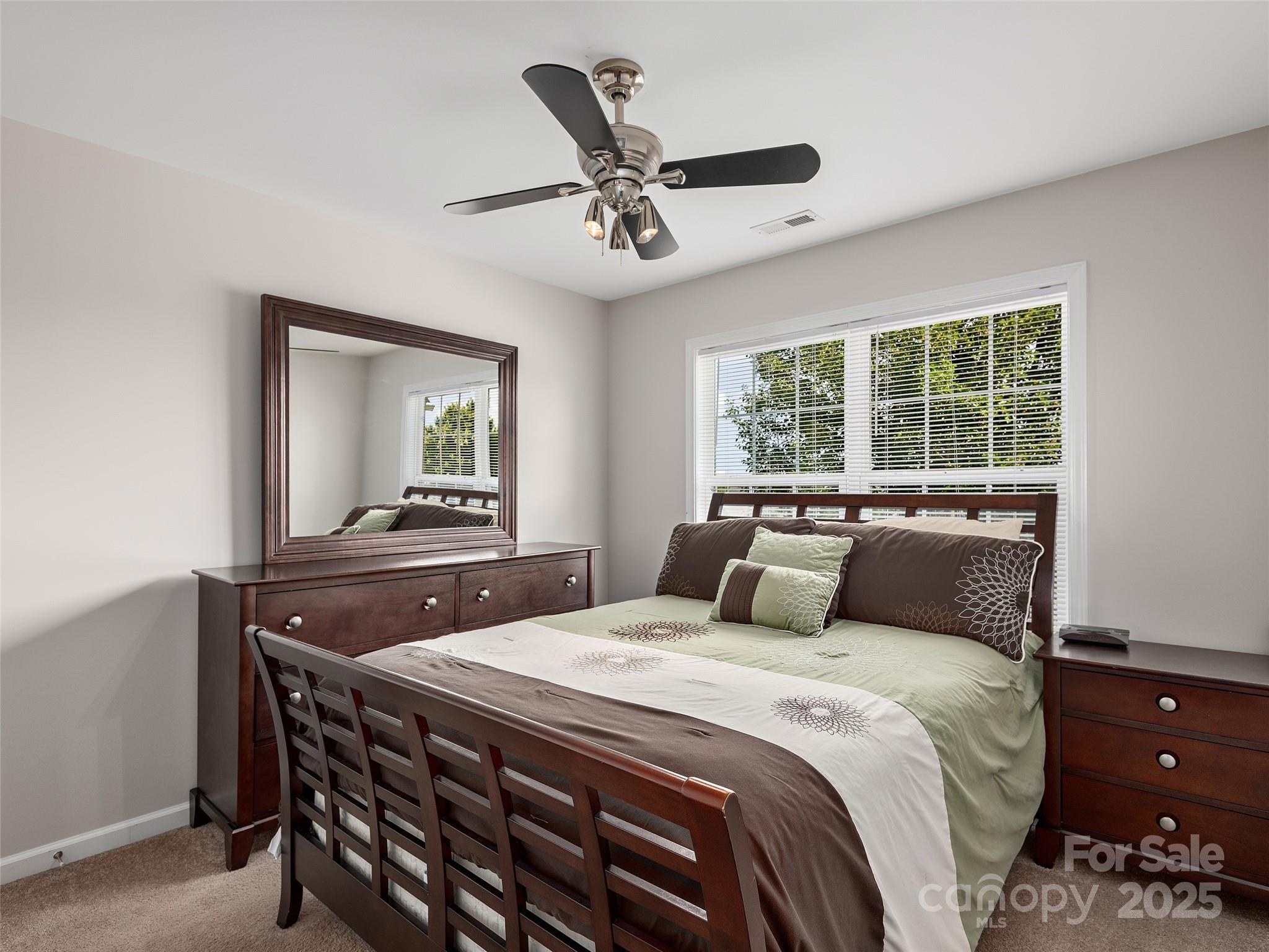 178 Black River Road Fletcher, NC 28732 - Photo 14 of 19 a bedroom with a bed and a table