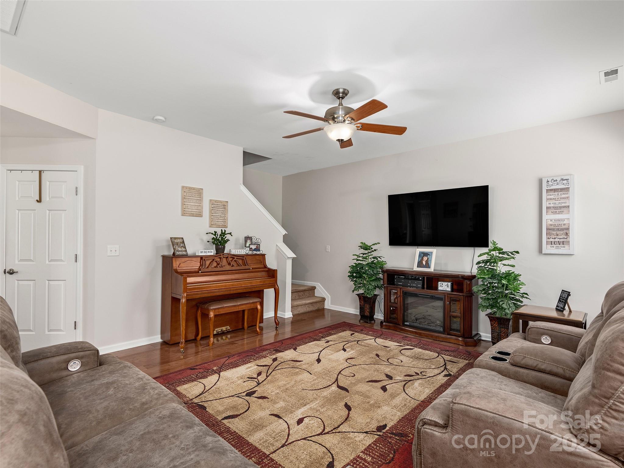 178 Black River Road Fletcher, NC 28732 - Photo 3 of 19 a living room with furniture and a flat screen tv