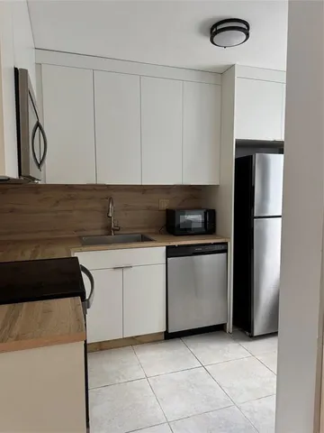 $1,950 | 313 Gardens Drive, Unit 104, Pompano Beach, FL 33069