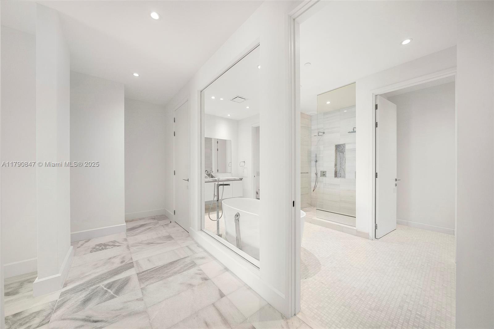 700 Northeast 26th Terrace, Unit TH403 Miami, FL 33137 - Photo 28 of 85 a bathroom with a shower and a glass door