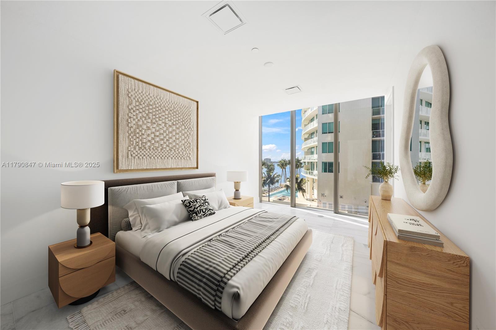 700 Northeast 26th Terrace, Unit TH403 Miami, FL 33137 - Photo 33 of 85 a bedroom with furniture and a large window