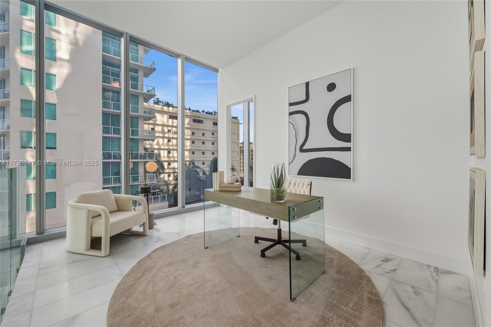 700 Northeast 26th Terrace, Unit TH403 Miami, FL 33137 - Photo 36 of 85 a living room with furniture and a window