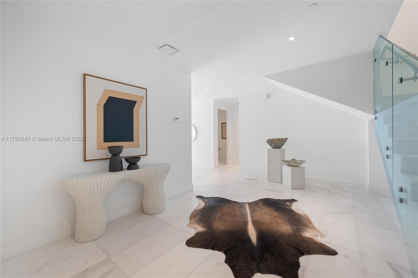 700 Northeast 26th Terrace, Unit TH403 Miami, FL 33137 - Photo 39 of 85 a living room with furniture and a flat screen tv