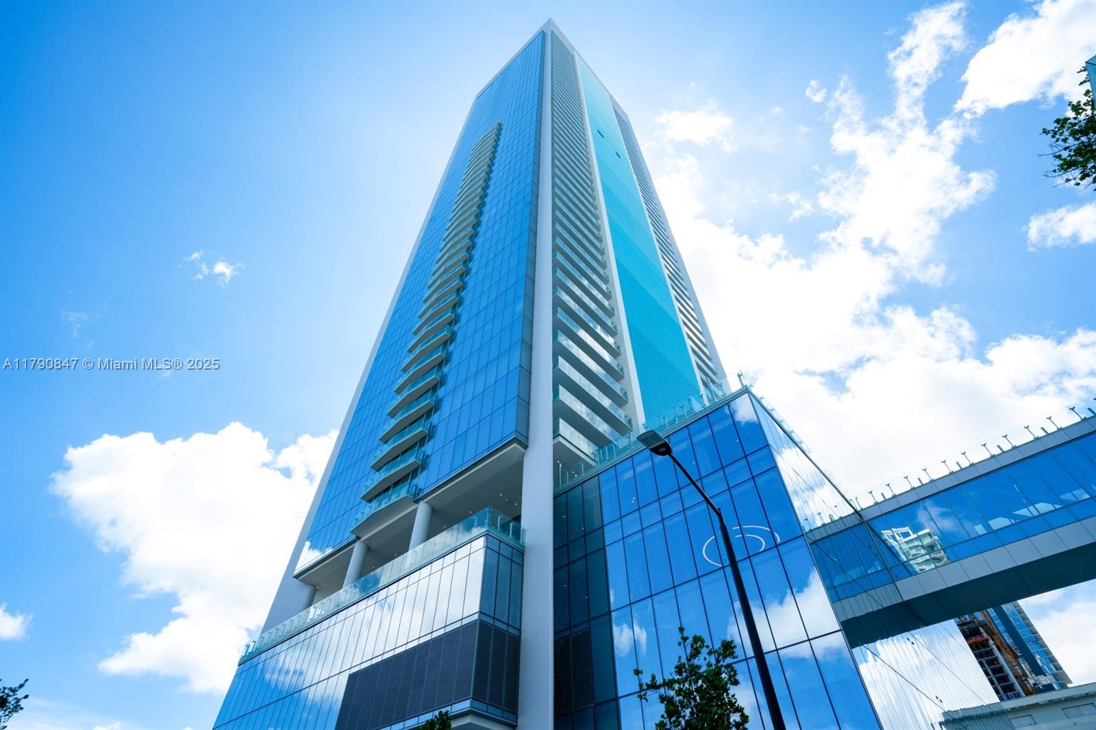 700 Northeast 26th Terrace, Unit TH403 Miami, FL 33137 - Photo 43 of 85 a view of a house with a backyard