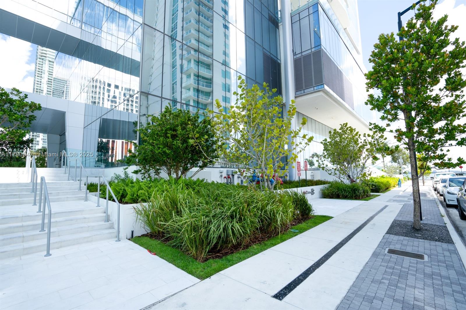 700 Northeast 26th Terrace, Unit TH403 Miami, FL 33137 - Photo 47 of 85 a view of a garden with pathway
