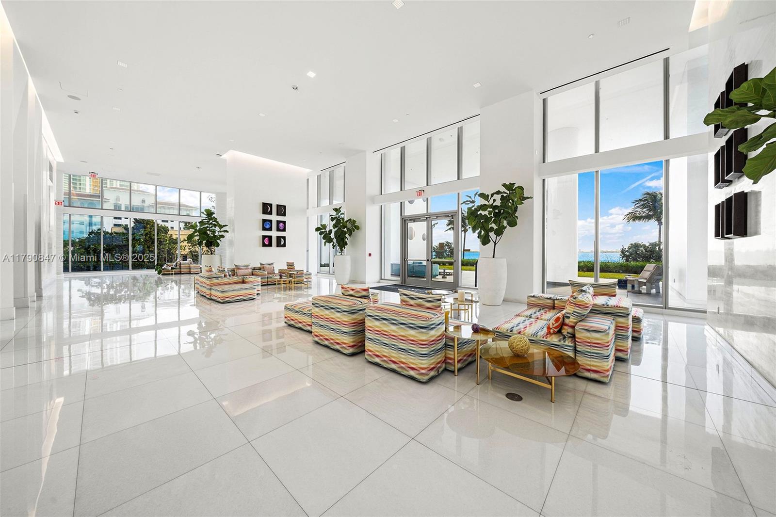 700 Northeast 26th Terrace, Unit TH403 Miami, FL 33137 - Photo 49 of 85 a living room with patio furniture and a potted plant