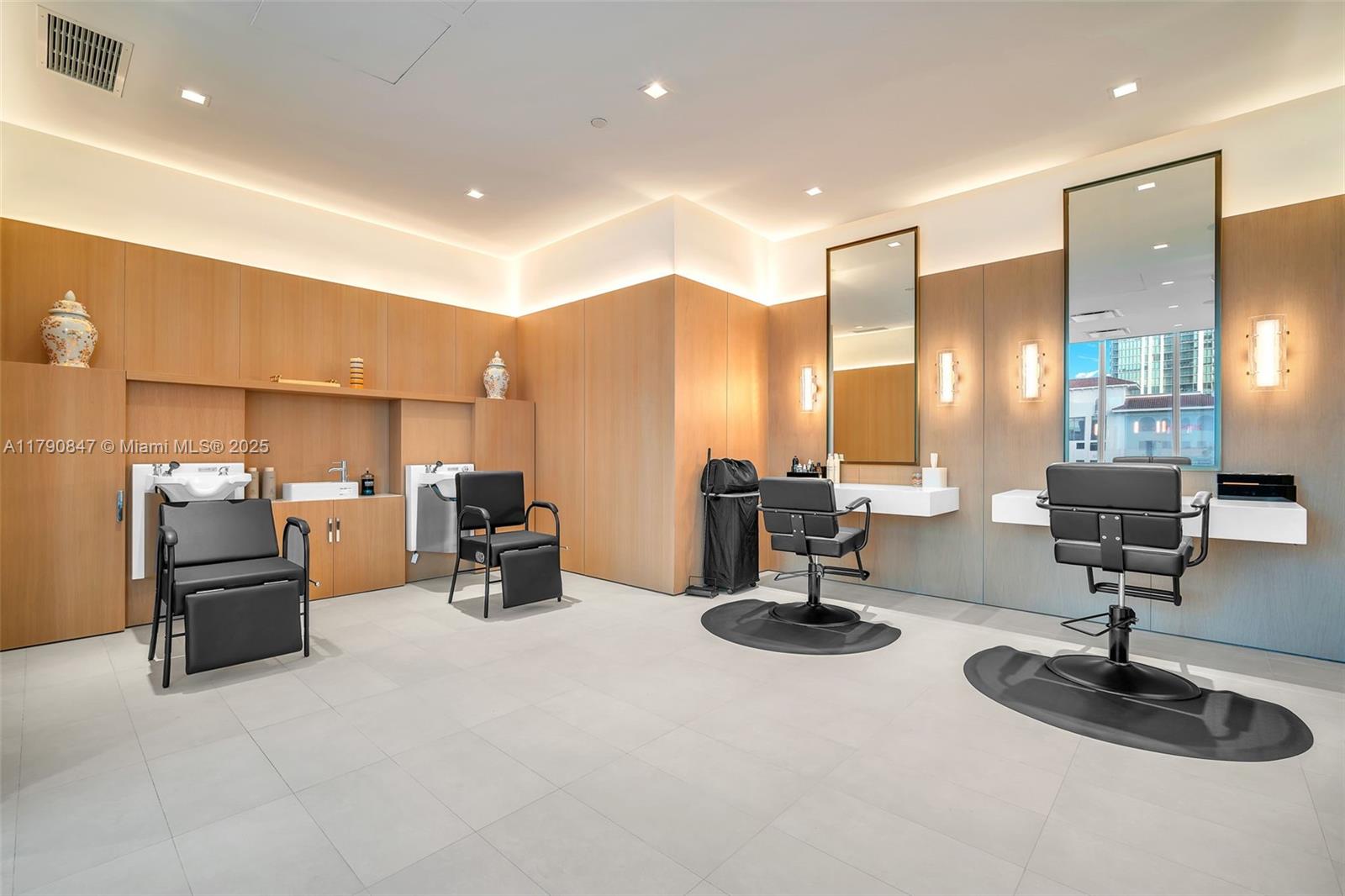 700 Northeast 26th Terrace, Unit TH403 Miami, FL 33137 - Photo 66 of 85 a view of a lobby with furniture and a chandelier