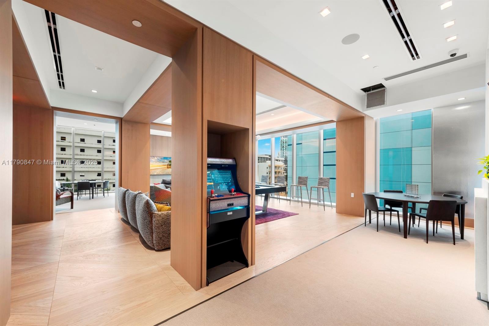 700 Northeast 26th Terrace, Unit TH403 Miami, FL 33137 - Photo 70 of 85 a view of a living room and dining room