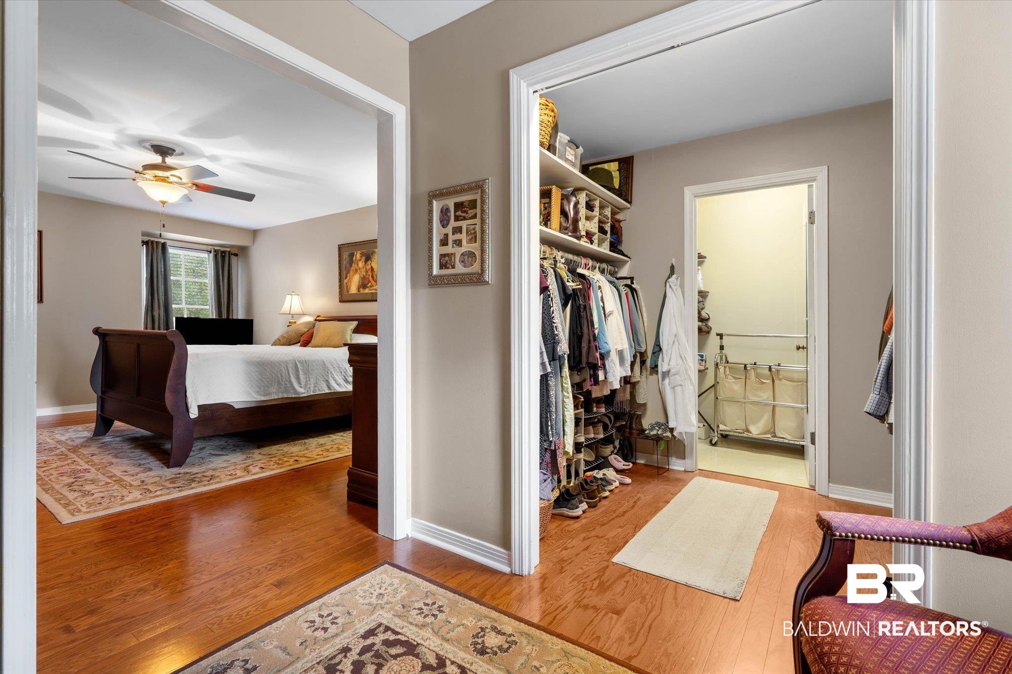 559 East Cumberland Road Mobile, AL 36608 - Photo 27 of 48 Bedroom featuring light wood finished floors and a walk in closet
