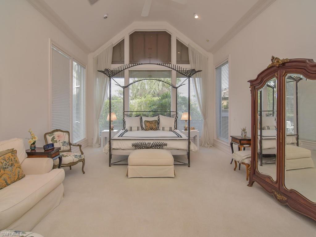 771 Brentwood Point Naples, FL 34110 - Photo 16 of 31 a living room with furniture with large windows