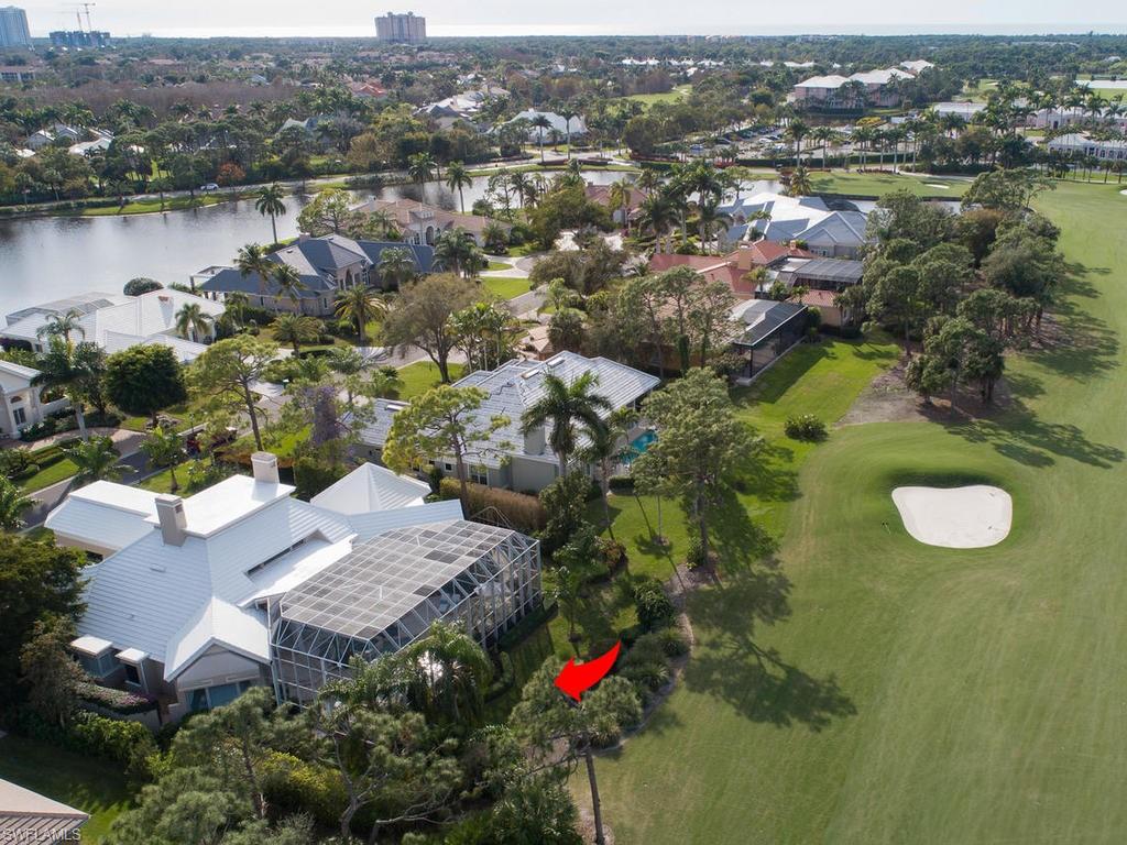 771 Brentwood Point Naples, FL 34110 - Photo 4 of 31 an aerial view of residential houses with outdoor space and lake view