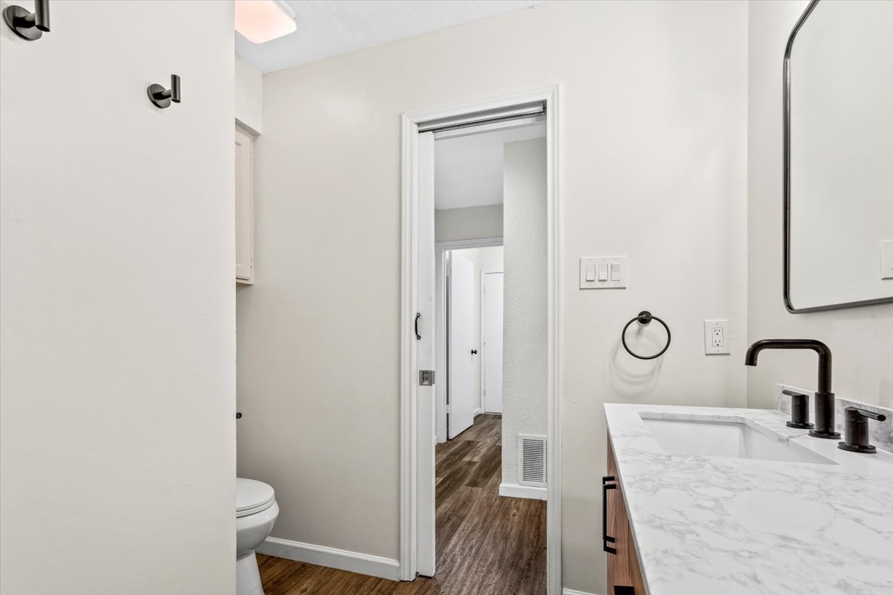 4004 Danli Lane Austin, TX 78749 - Photo 16 of 40 a bathroom with a sink and a mirror