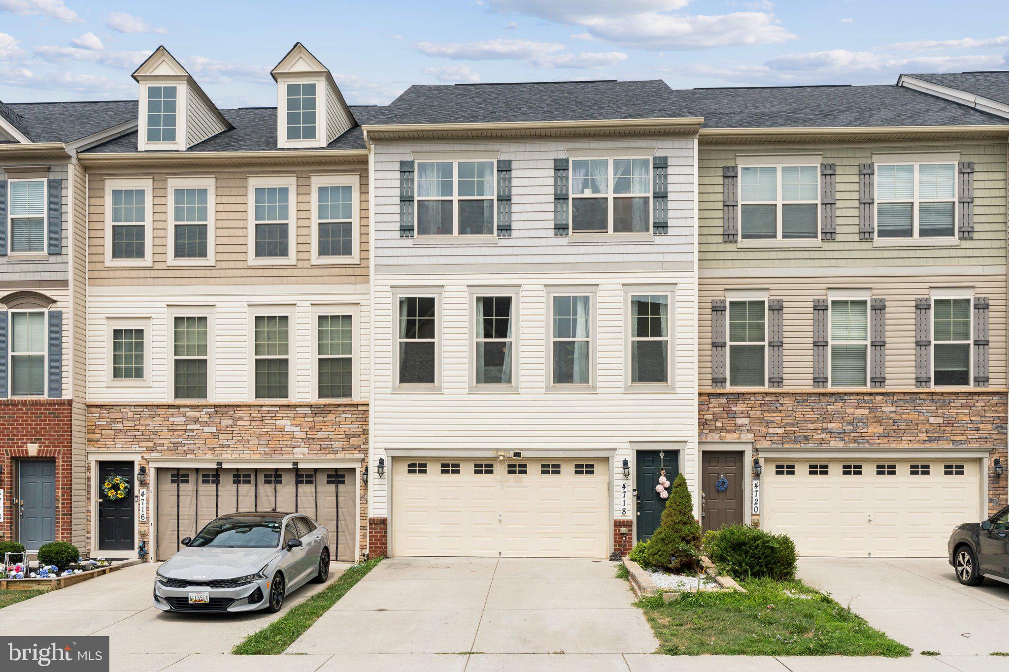 a front view of a building with parking space