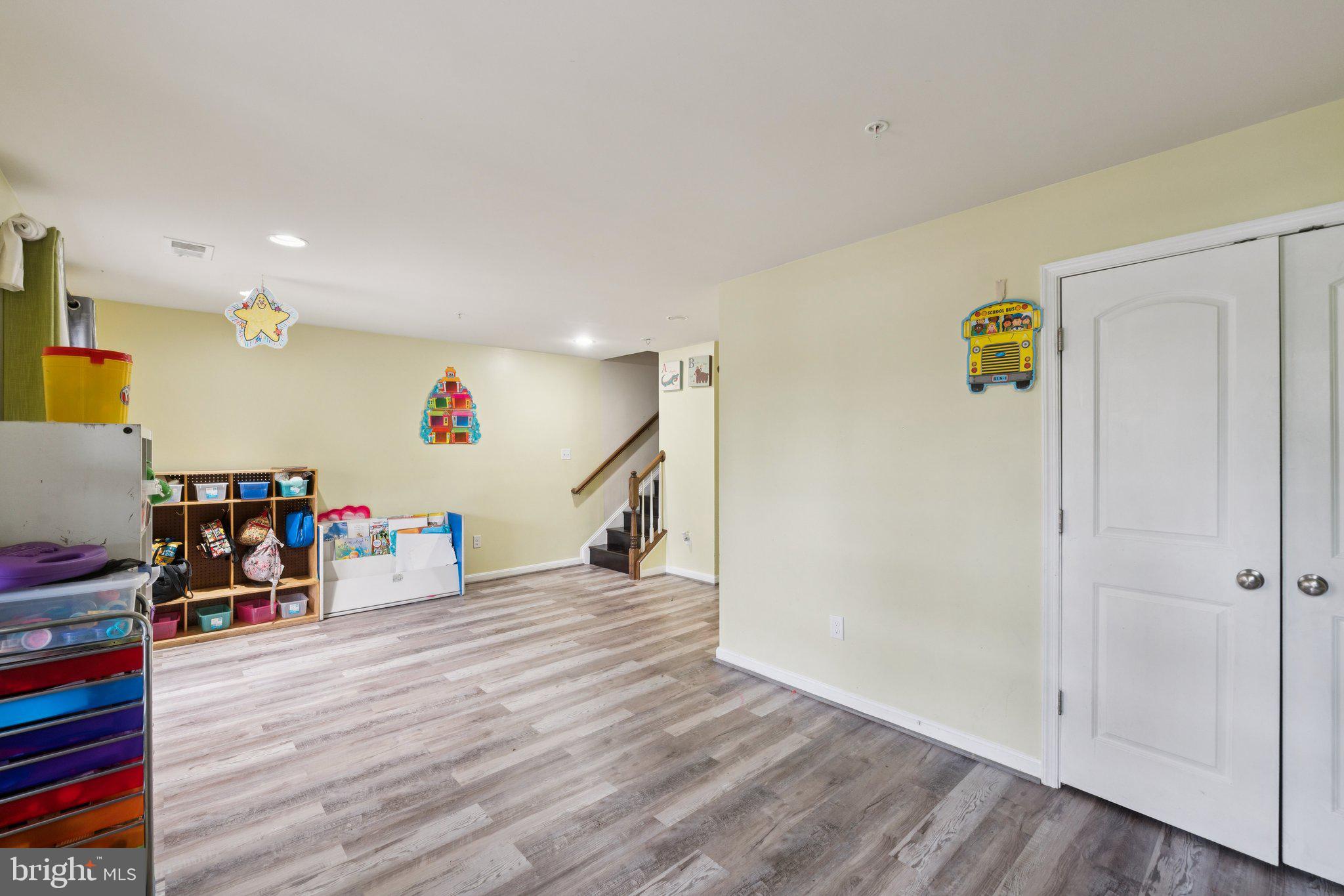 4718 Cambria Road Frederick, MD 21703 - Photo 21 of 32 a view of livingroom with furniture and wooden floor