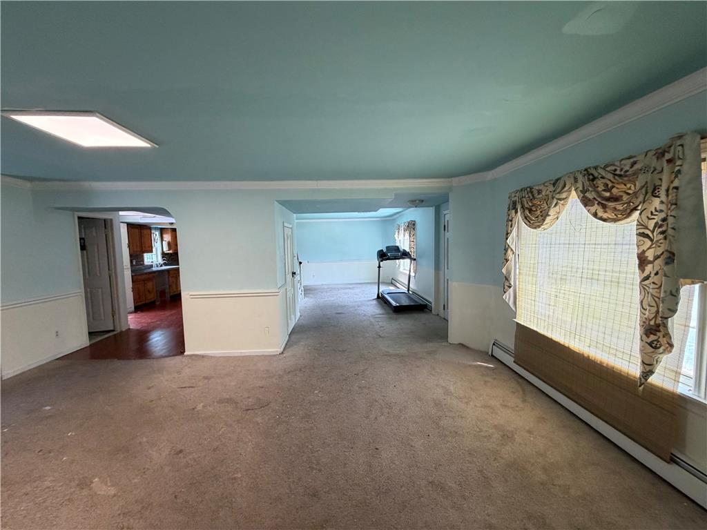 2552 Spring Street Coplay, PA 18037 - Photo 24 of 33 A versatile living space awaits, offering generous room for both relaxation and recreation.