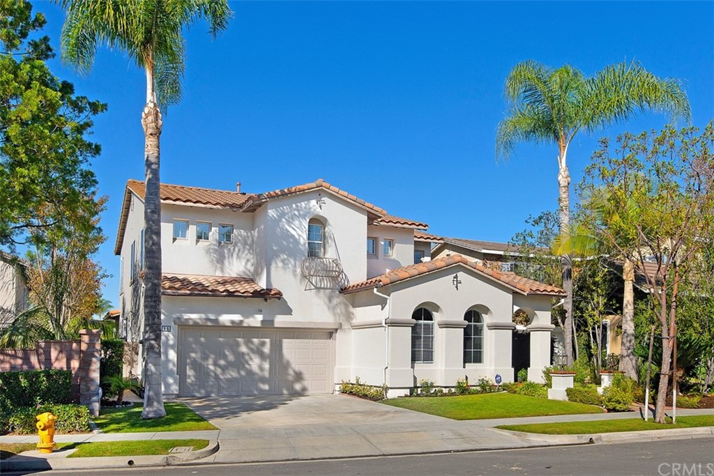 55 Kempton Lane Ladera Ranch, CA 92694 - Photo 1 of 1 a view of a white house with a big yard and potted plants