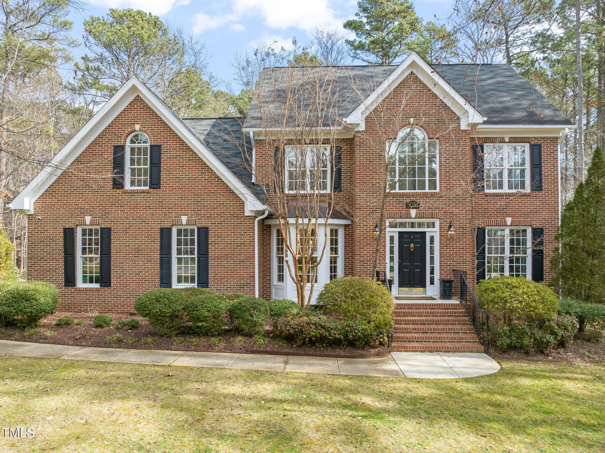 5032 Big Creek Road Raleigh, NC 27613 - Photo 1 of 46 a view of a house with a swimming pool