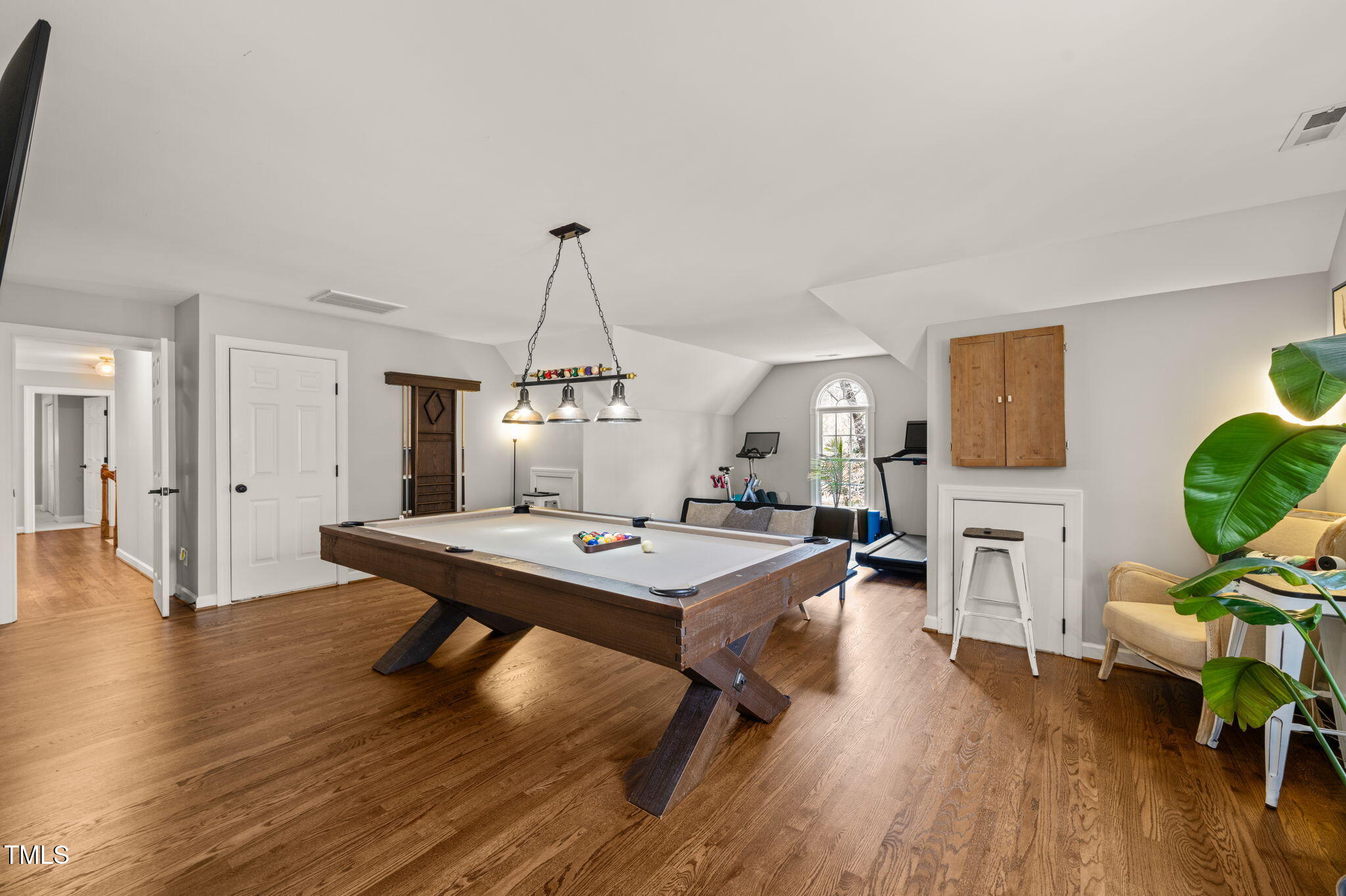 5032 Big Creek Road Raleigh, NC 27613 - Photo 32 of 46 a view of a livingroom with furniture and wooden floor
