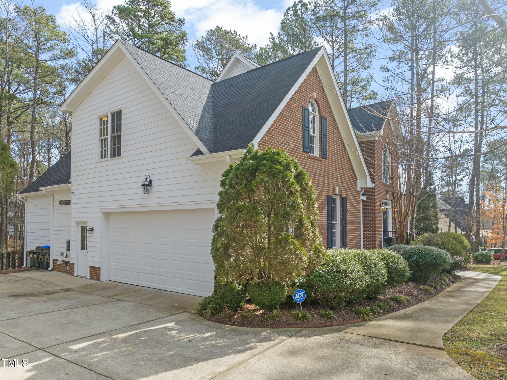 5032 Big Creek Road Raleigh, NC 27613 - Photo 43 of 46 a front view of a house with garden