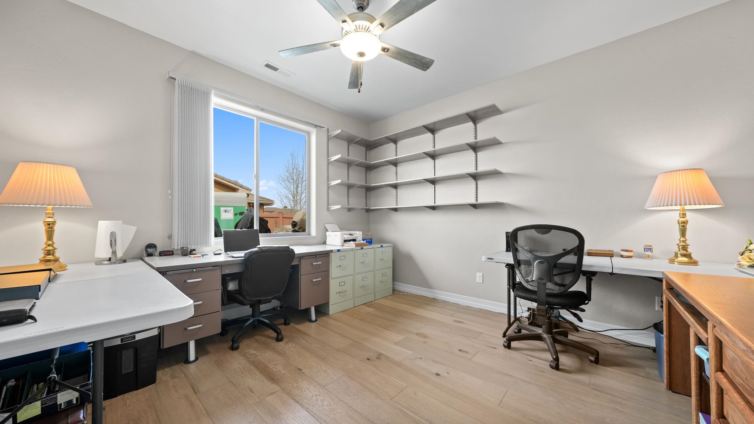 1295 Eagle Way Fruita, CO 81521 - Photo 19 of 36 a view of a workspace with furniture and a window
