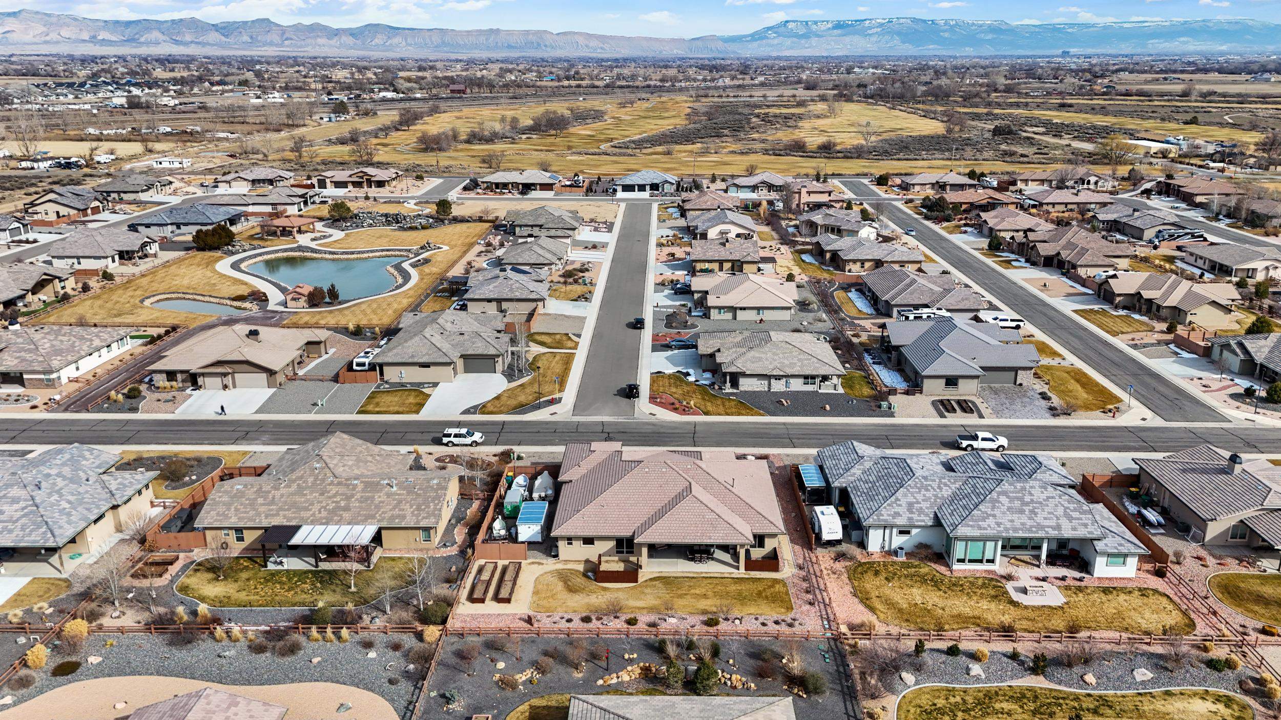 1295 Eagle Way Fruita, CO 81521 - Photo 32 of 36 an aerial view of residential houses with outdoor space