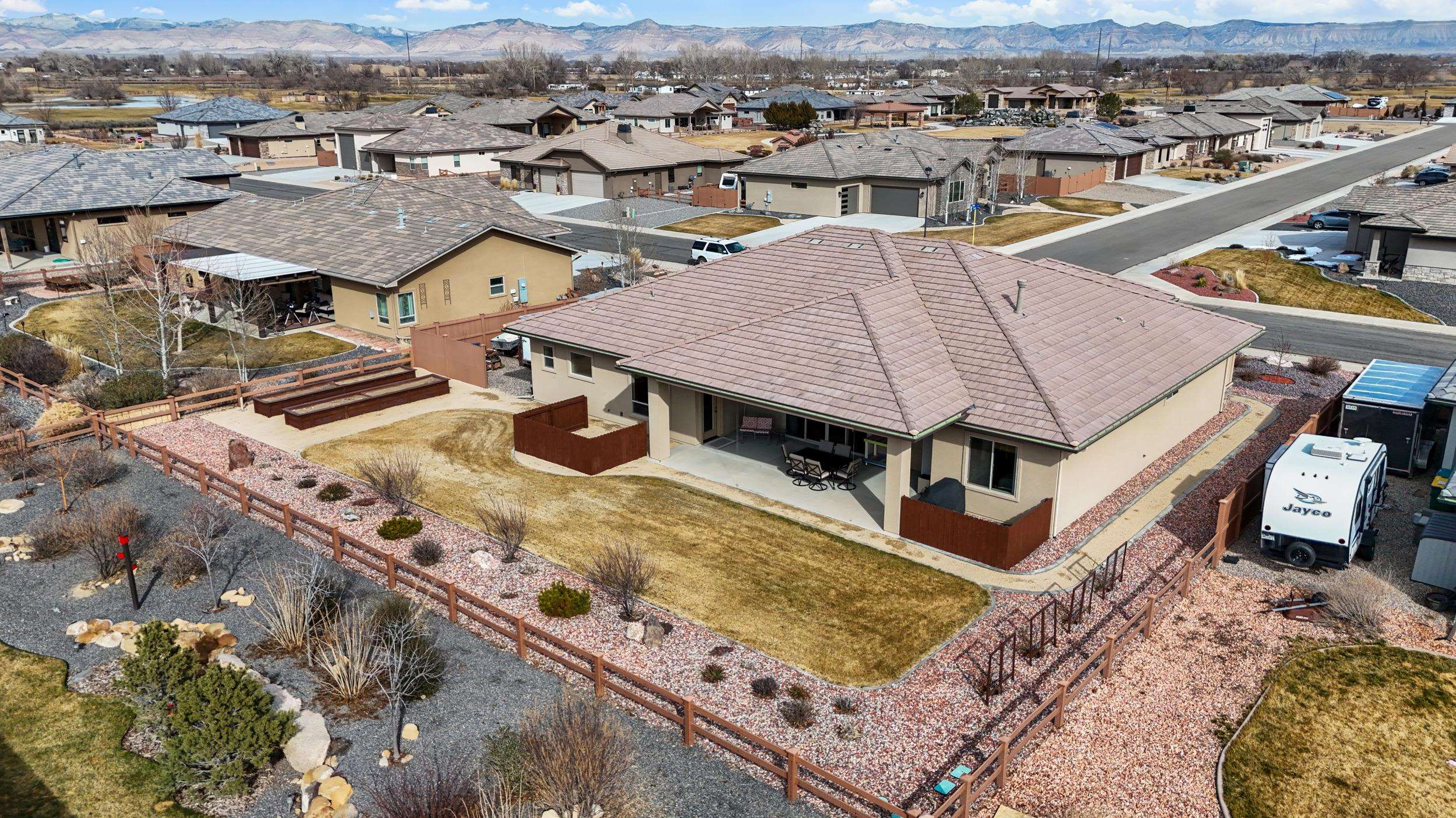 1295 Eagle Way Fruita, CO 81521 - Photo 33 of 36 an aerial view of a house with a mountain