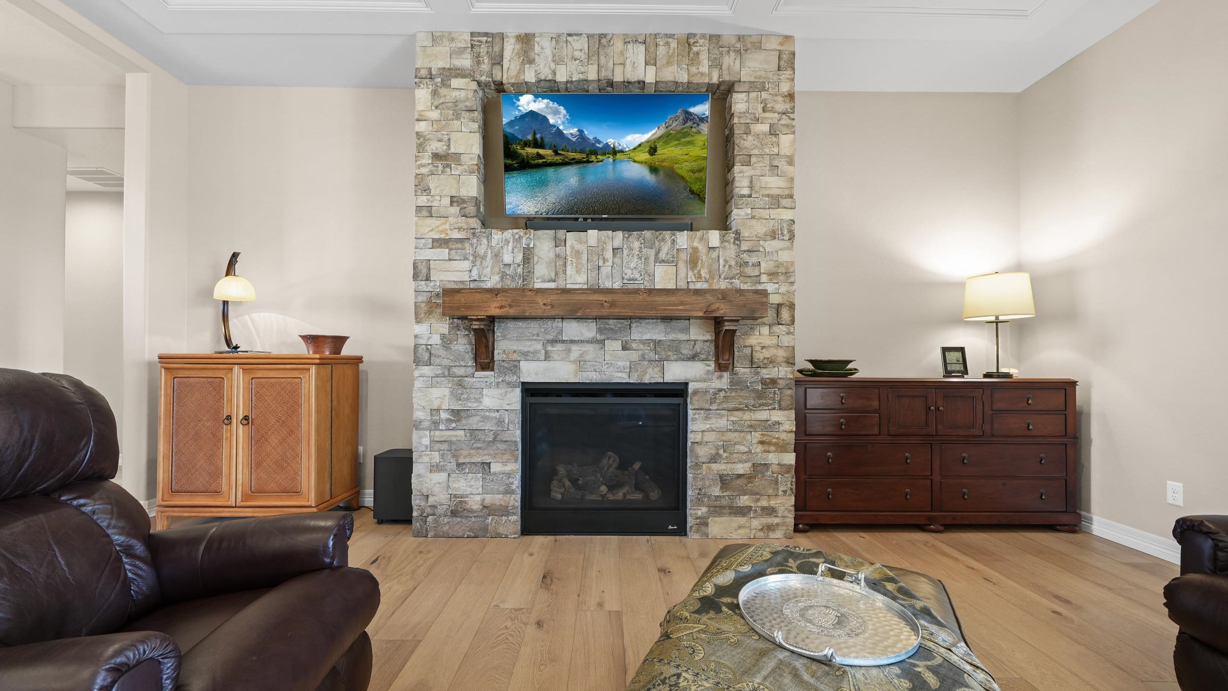 1295 Eagle Way Fruita, CO 81521 - Photo 6 of 36 a living room with furniture and a fireplace